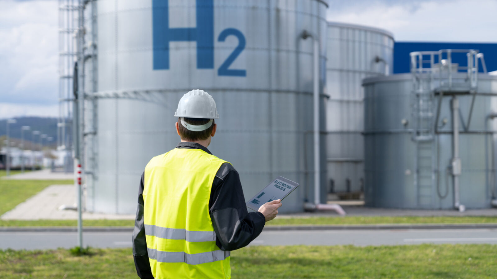 Engineer on a background of Hydrogen factory